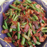 Overhead photo of green beans with bacon and caramelized onions.