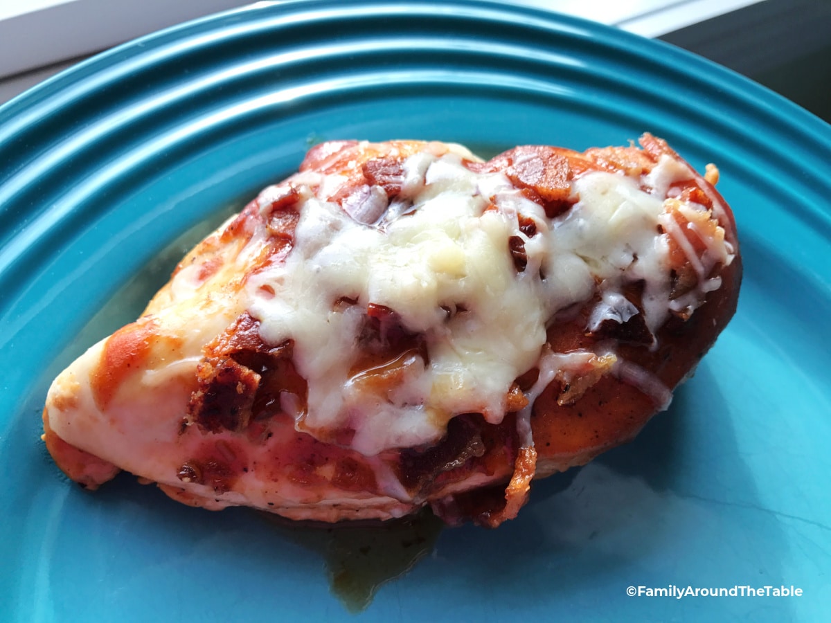 Barbecue Bacon Cheddar Chicken on a blue plate.