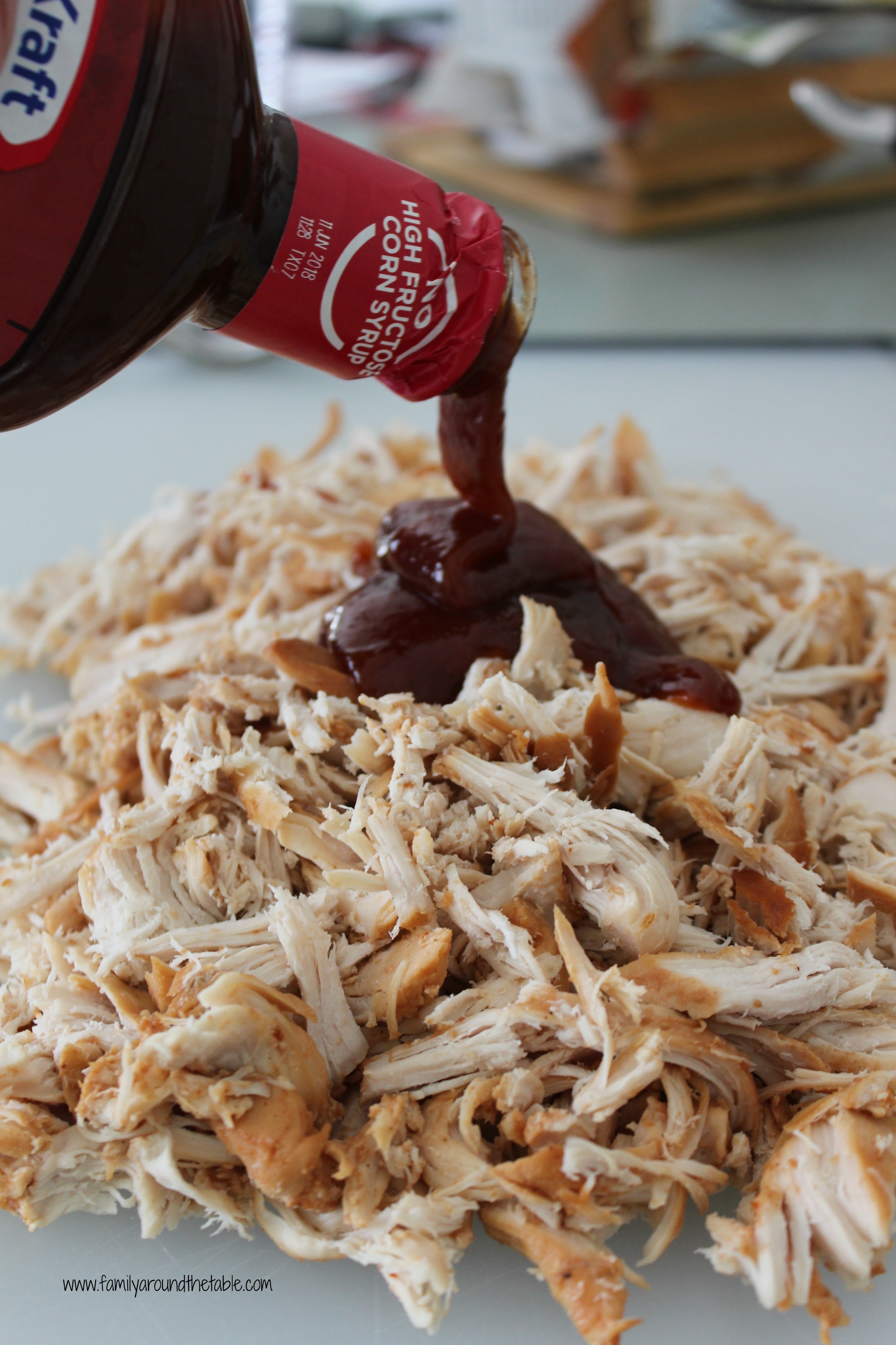 Pulled chicken made with the convenience of a slow cooker.