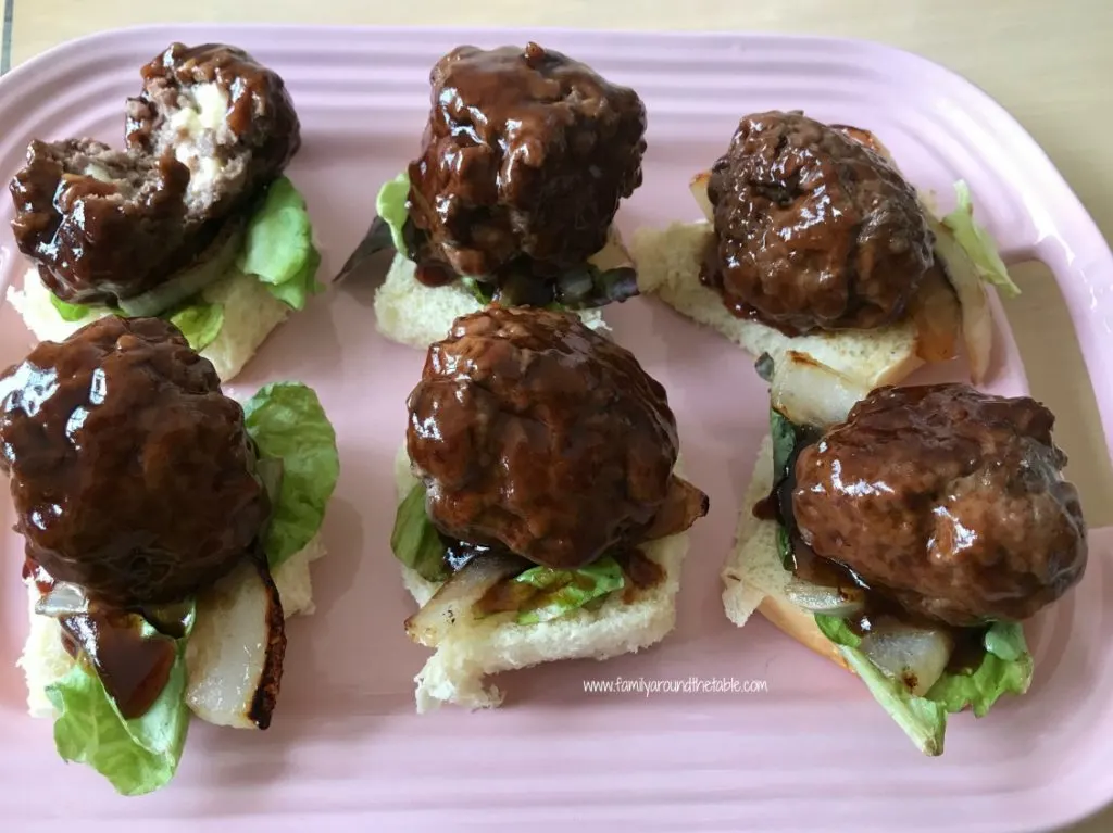 Sweet and Smoky Juicy Lucy BBQ Sliders are perfect for lunch, dinner or game day.