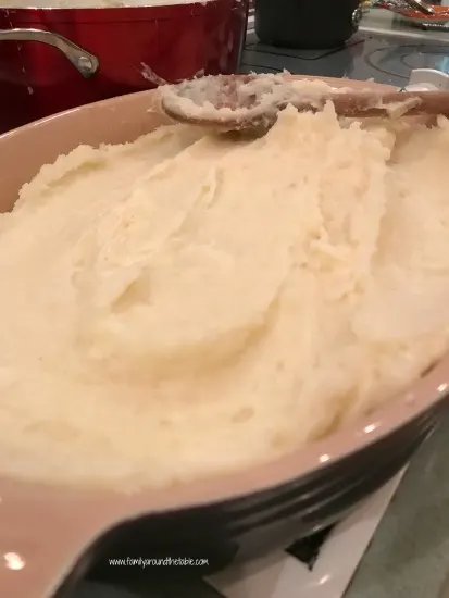 Spread the mashed potato mixture in the prepared casserole dish.
