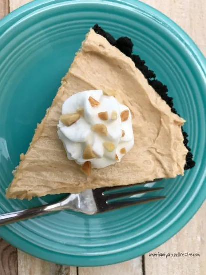 Mom's Peanut Butter Pie with Chocolate Crust on a blue plate