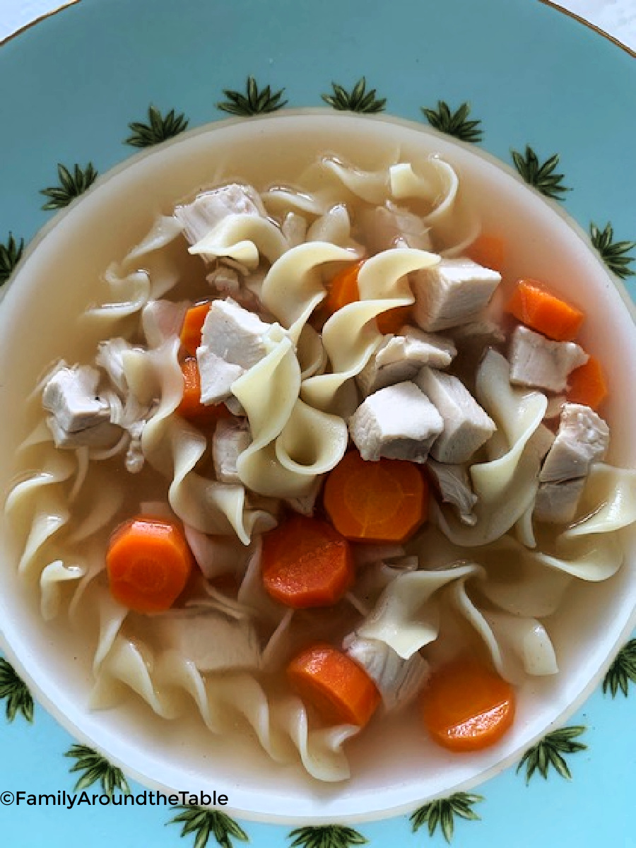Overhead photo of chicken noodle soup in a bowl.