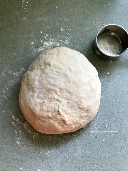 Easy homemade pizza dough saves money on pizza night.