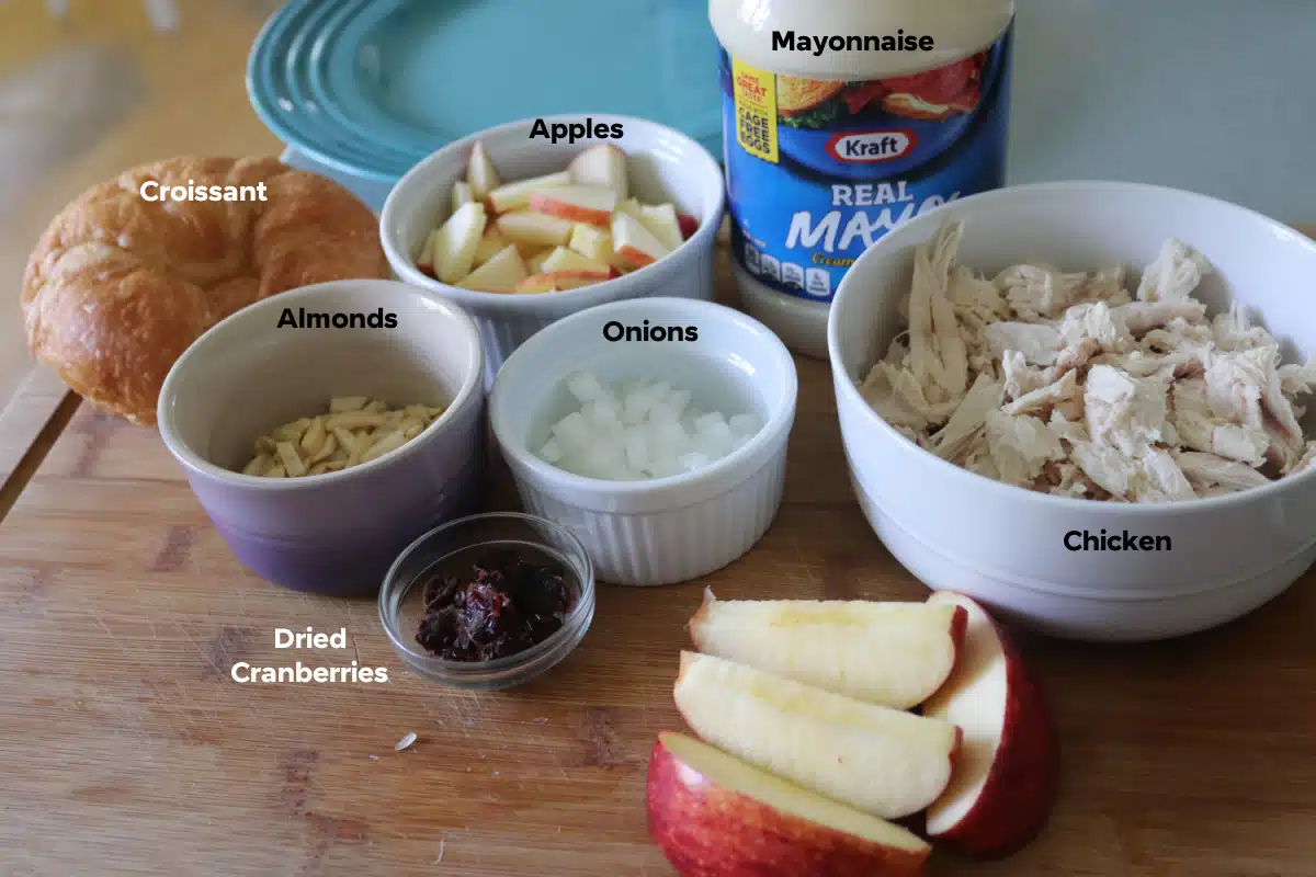 A photo of ingredients needed for apple chicken salad.