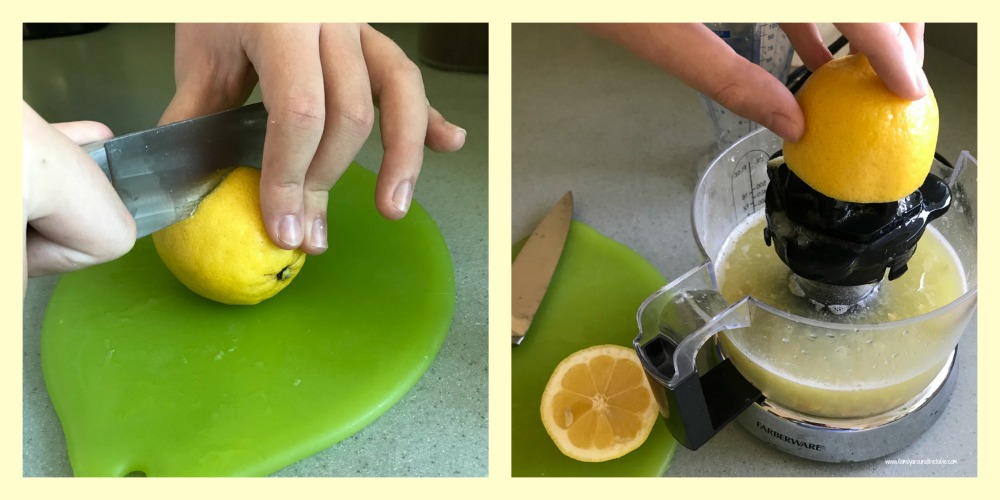 Cutting and juicing lemons for blueberry lemonade. 