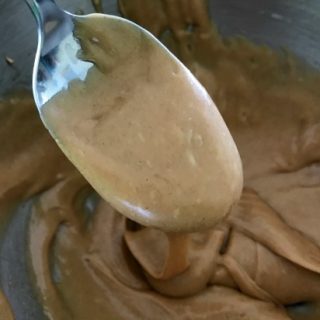 Smooth and creamy peanut butter glaze can be used to glaze a cake or over ice cream.