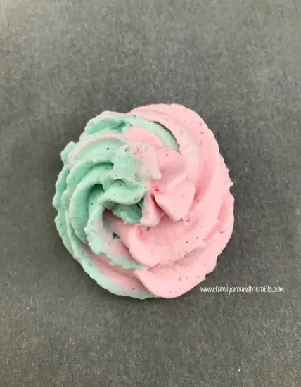 Mermaid swirl whipped cream is a fun addition to cupcakes or an ice cream cake.