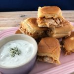 Easy Buffalo chicken sliders with homemade blue cheese dressing is great for tailgate or game day parties.