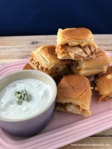Easy Buffalo chicken sliders with homemade blue cheese dressing is great for tailgate or game day parties.