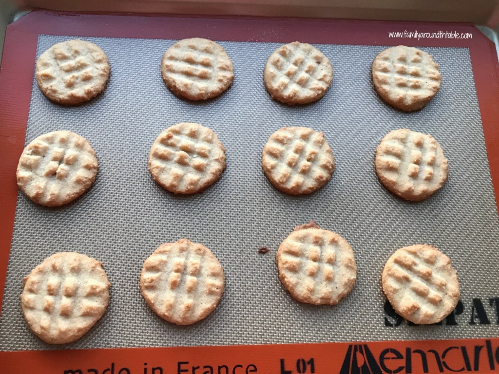 Peanut butter cookie recipe on a cookie sheet.