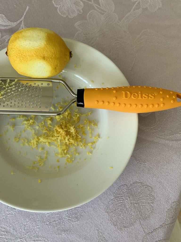 Zesting a lemon with the Deiss zester.