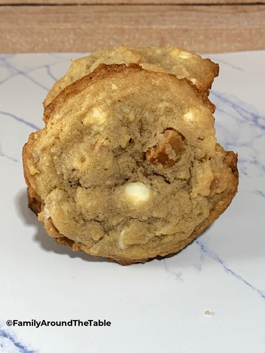 Front view of a stack of white chocolate macadamia nut cookies.