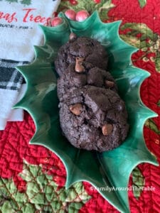 Gluten-free brownie cookies on a green plate.