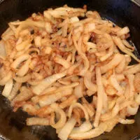 Caramelized onions in an iron skillet.