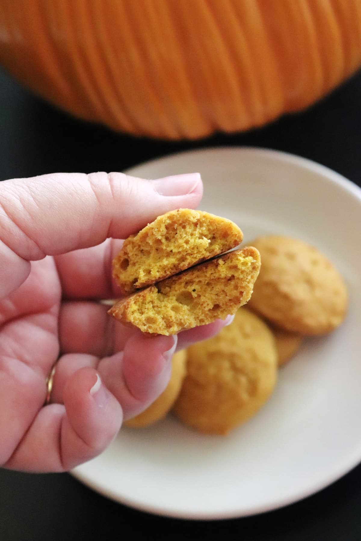 The inside of a soft pumpkin cookie.