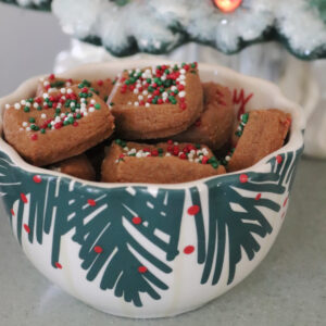 Gingerbread bites in a holiday bowl.