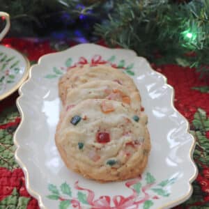Fruitcake cookies on a Christmas plate.