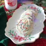 Vanilla pudding cookies on a Christmas plate.