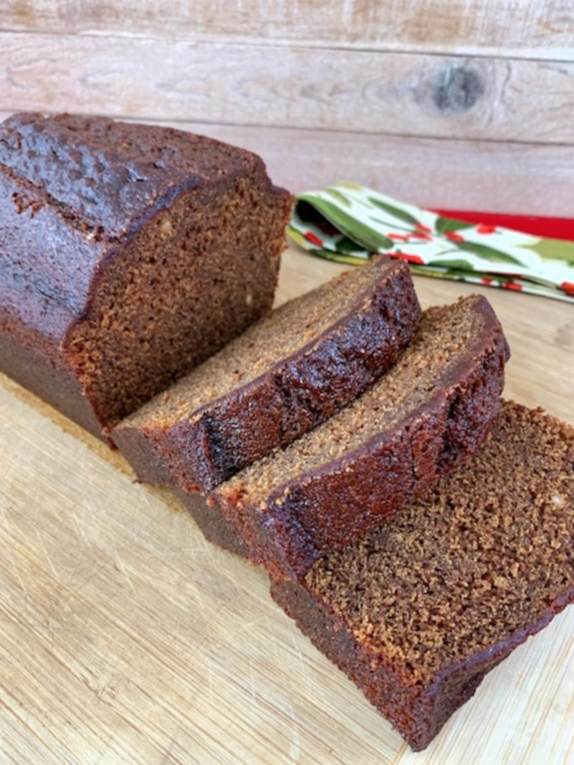 Side view of a sliced gingerbread loaf.